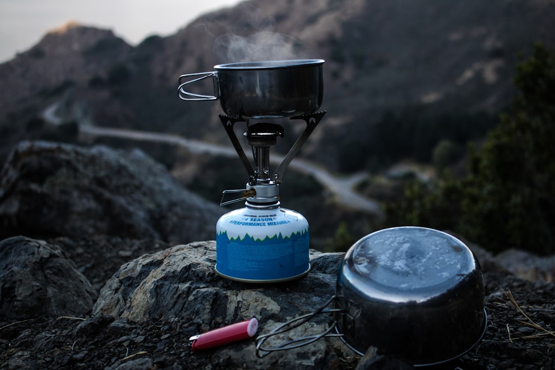 A close-up shot of the Captain Stag Portable Gas Stove in action, highlighting its functionality and