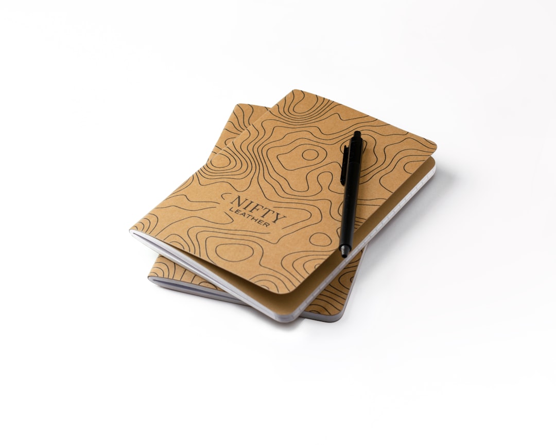 An image of the Midori MD Notebook opened to showcase its smooth paper and minimalist design, with a