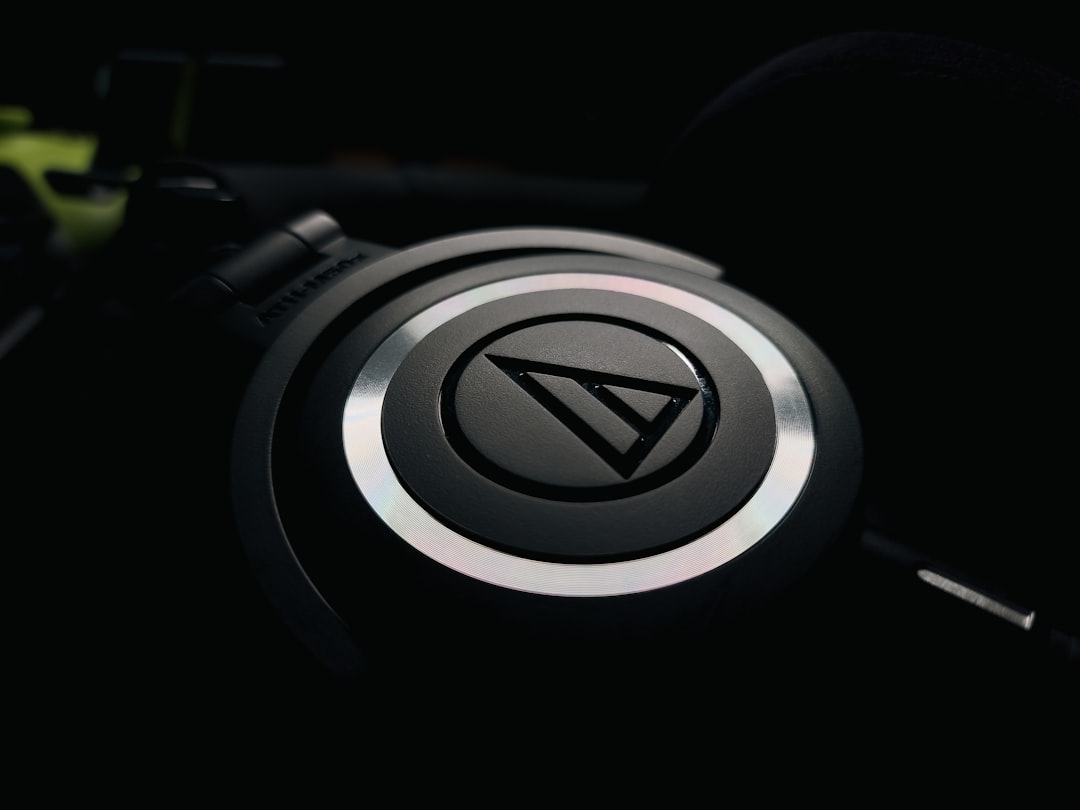 A close-up shot of Audio-Technica ATH-M50xBT headphones emphasizing the ear padding and build qualit