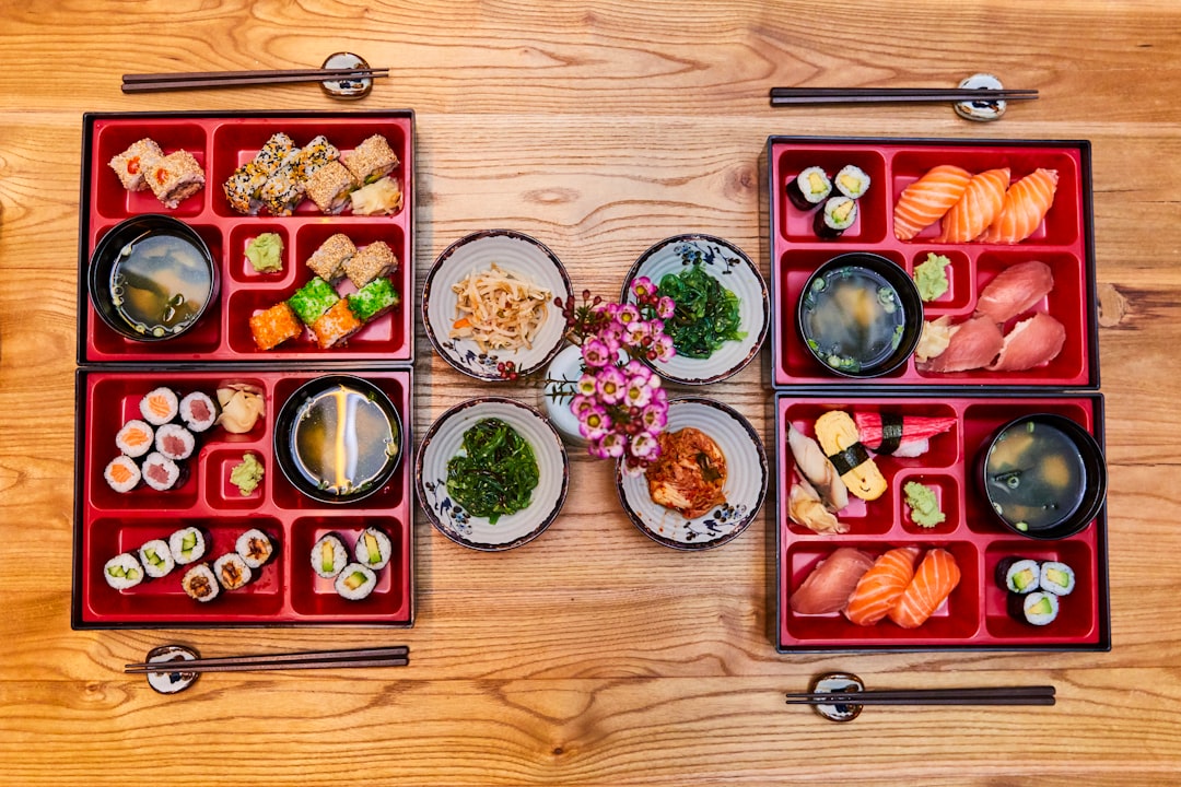 Artistic shot of the Hakoya Classic Bento Box filled with colorful, traditional Japanese food items,
