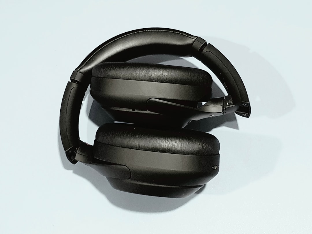 Close-up shot of the Sony WH-1000XM4 headphones, highlighting the touch sensor controls and ear cups