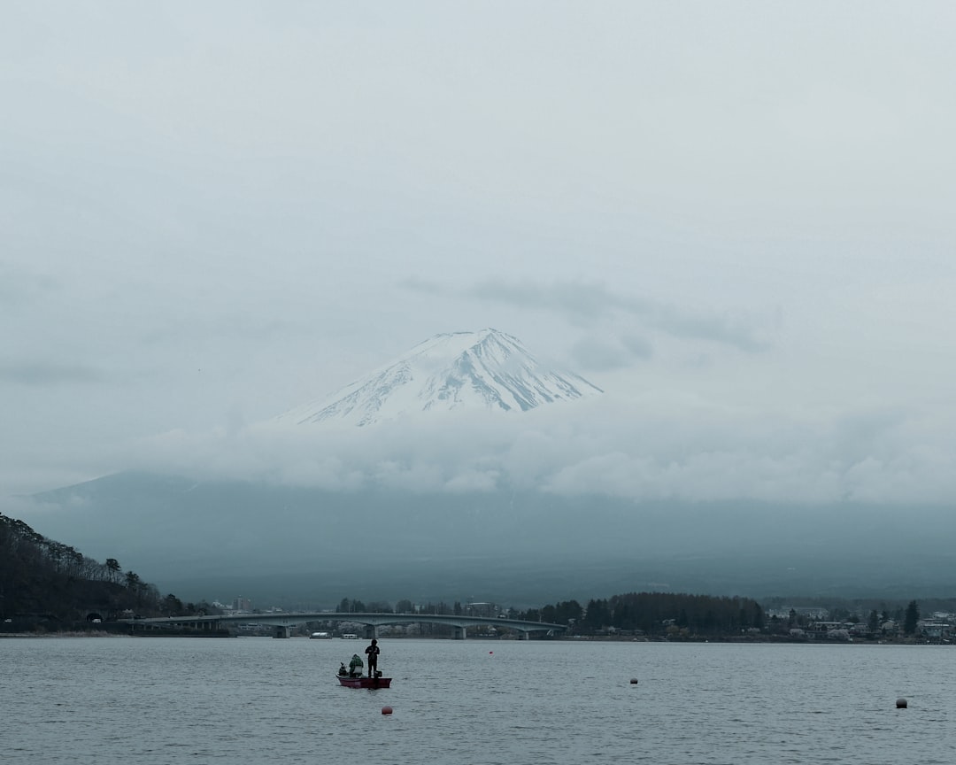 A breathtaking landscape shot of a stunning Japanese outdoor scene, showcasing a photographer captur