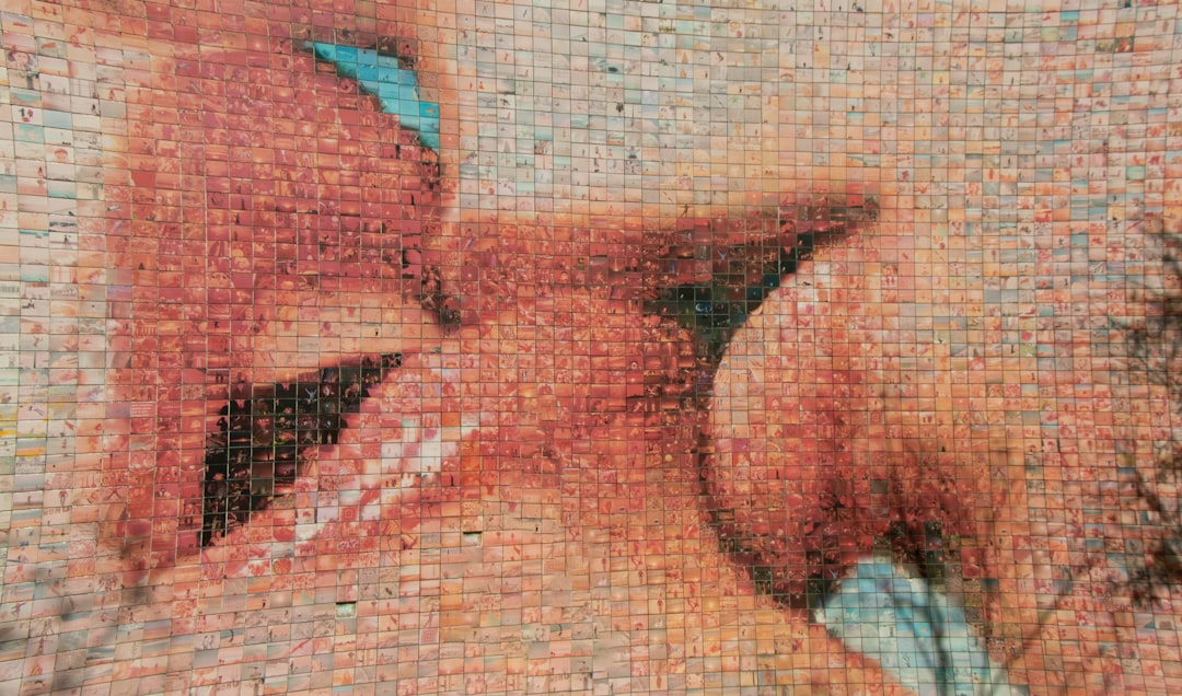 Close-up shot of the Tombow Mono Zero Eraser, showcasing its slim, retractable design alongside a pe