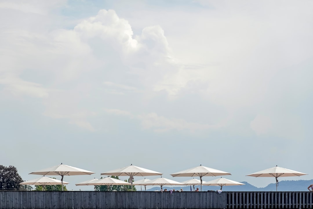 A dynamic image of a person swimming in the ocean, with a focus on the Nivea Sun Protect Water Gel S