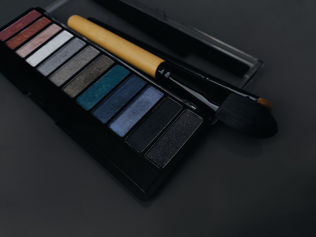 An image of a Muji makeup brush being used to apply makeup, showcasing the brush's quality and ergon