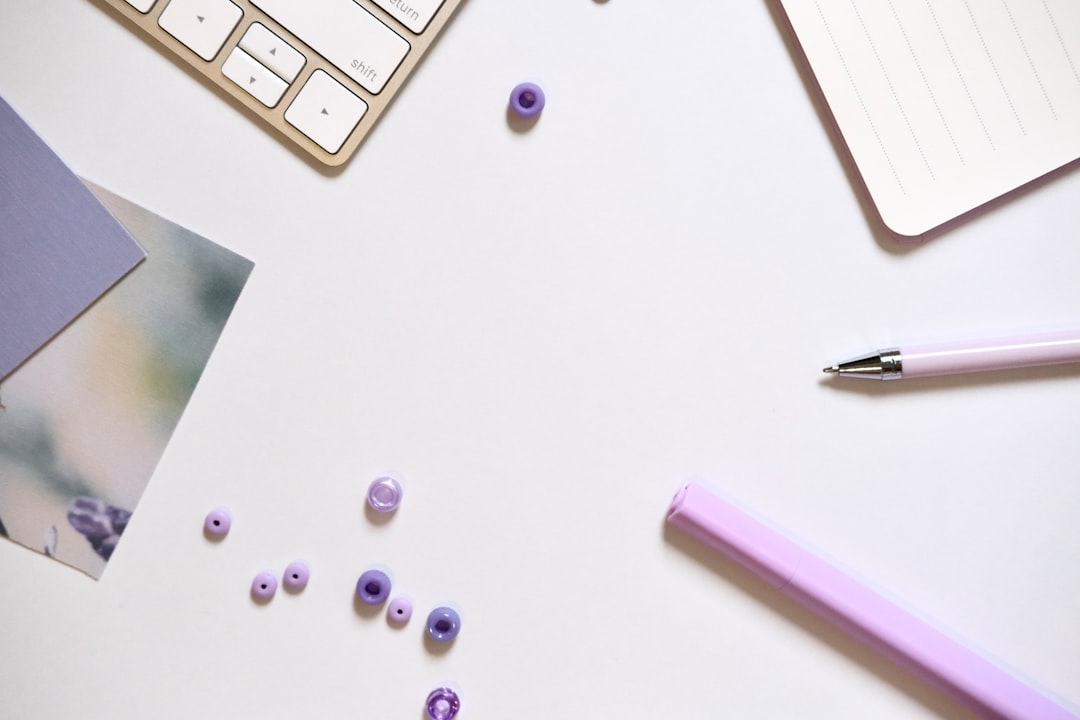 A flat lay image showcasing the Pentel and Uni Mitsubishi erasers alongside various art supplies suc