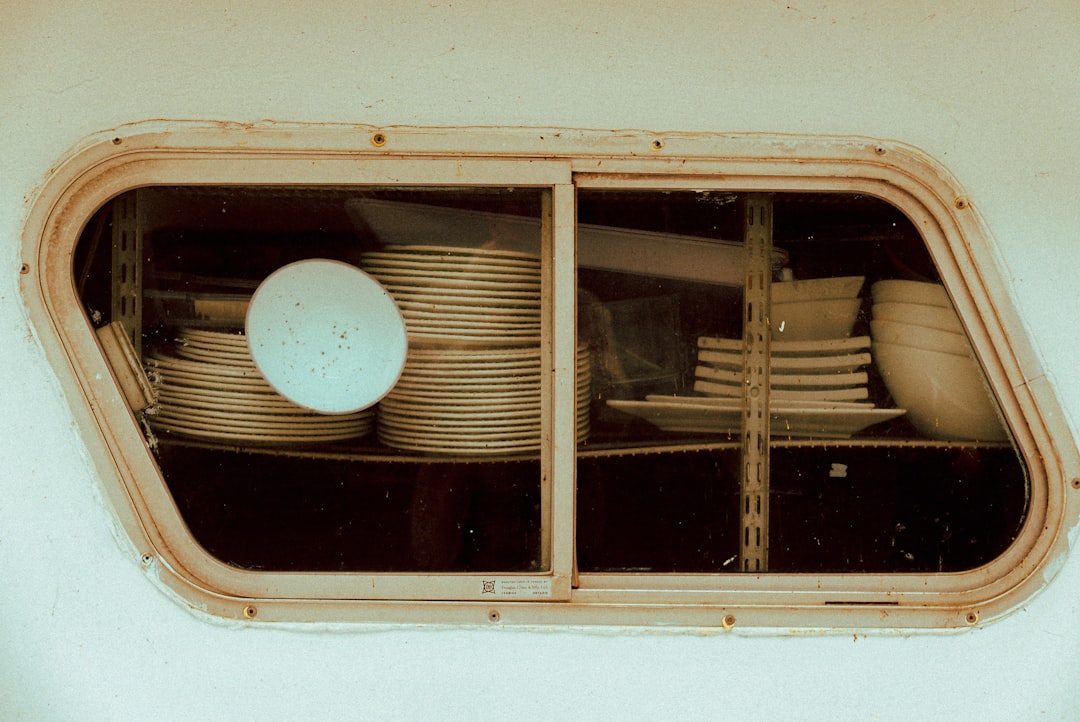 A rustic image of the Hakoya Bento Box made from natural wood, showcasing its compartments and fille