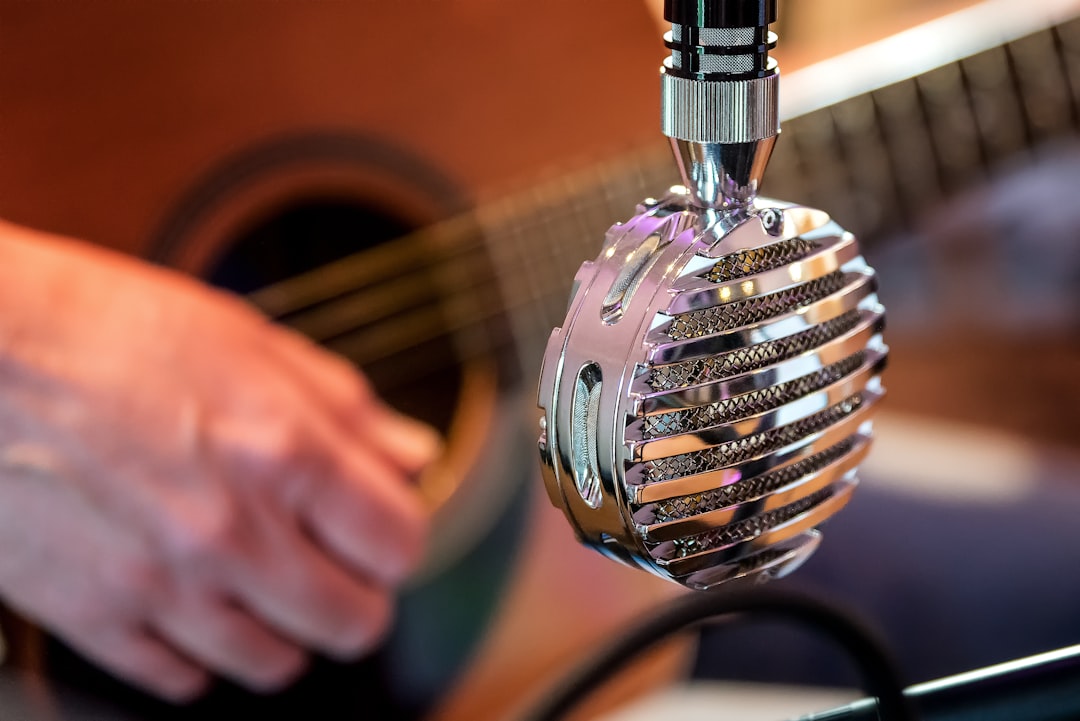 Image of the Audio-Technica AT2020 microphone in a recording studio setup, capturing the essence of 