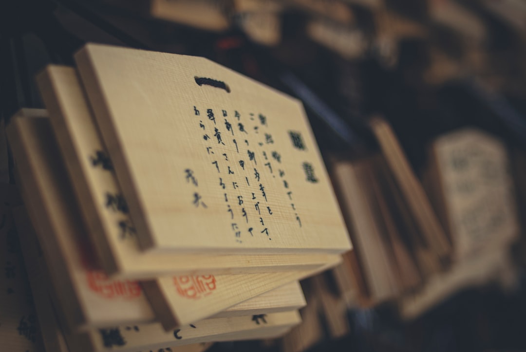 An aesthetically pleasing flat lay of various Japanese notebooks, including Midori, Leuchtturm, and
