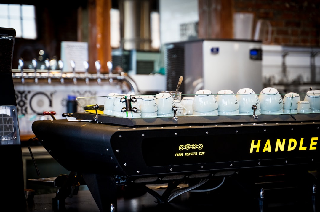 A beautifully styled flat lay of Hario coffee brewing equipment, including the V60 Dripper, Buono Ke