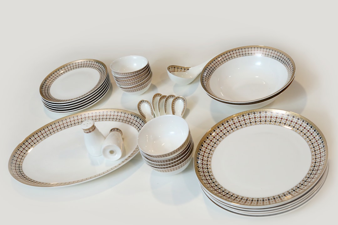 An image showcasing a beautifully styled table setting with Muji Ceramic Cookware featuring a quiche