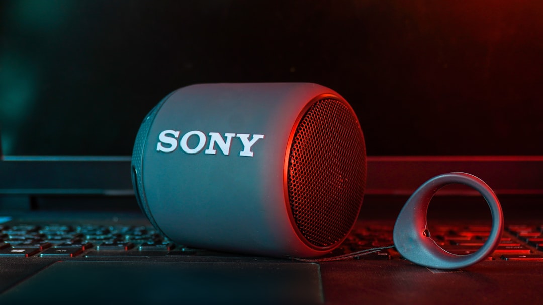 An image showcasing the Sony SRS-XB43 Bluetooth Speaker with a forest backdrop, emphasizing its rugg