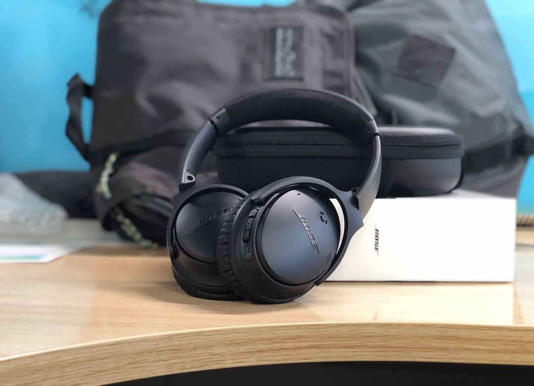 A visually striking image featuring the Sony WH-1000XM4 and Audio-Technica ATH-M50x headphones side