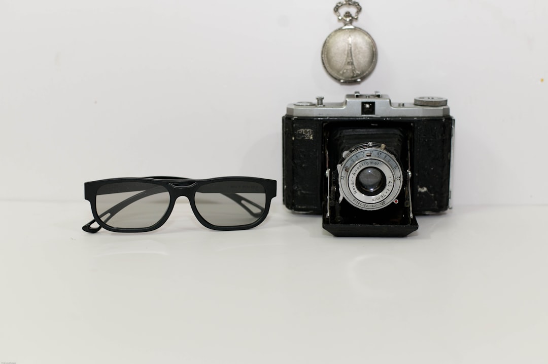 An infographic-style image comparing key specifications of Fujifilm and Panasonic cameras mentioned 