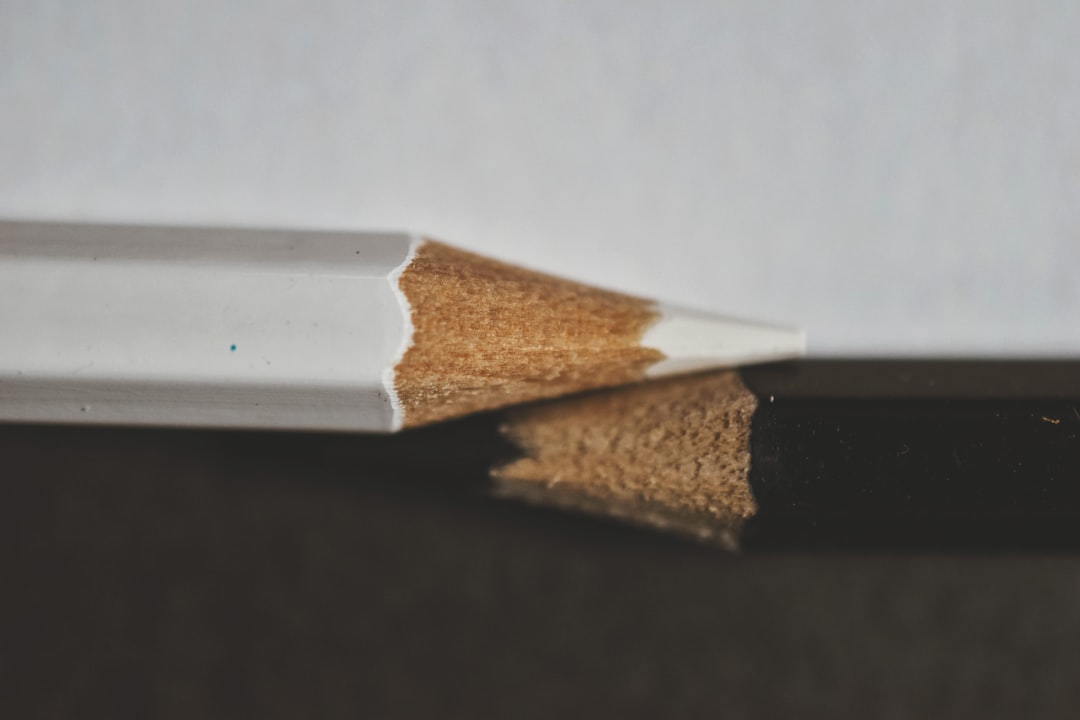 An image showing a close-up of the Pilot G2 gel pen with its ink flow visible on paper, emphasizing