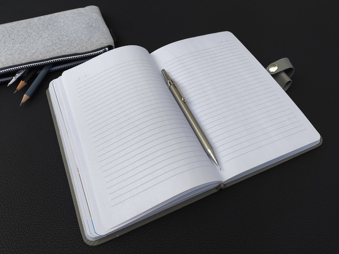 A visually appealing image of the Nanami Paper Seven Seas Notebook with a fountain pen, demonstratin