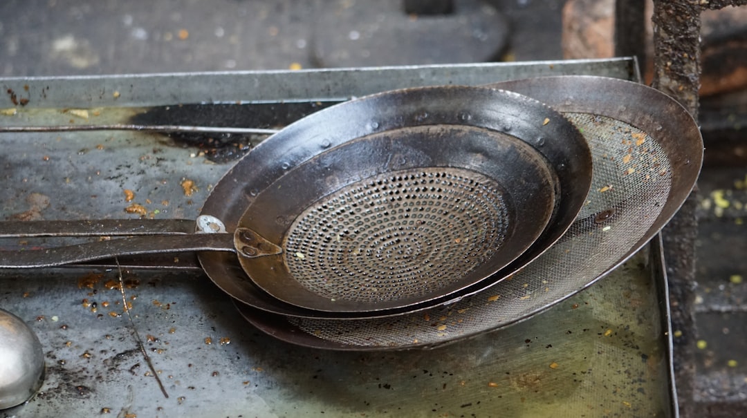 An image showing the proper care process of Nambu Tekki cookware, including cleaning and seasoning s