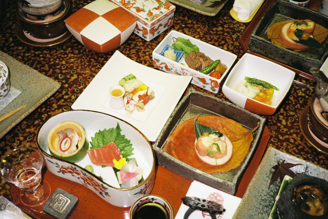 A visually appealing layout of various Nambu Tekki cookware items (teapot, frying pan, dutch oven) o
