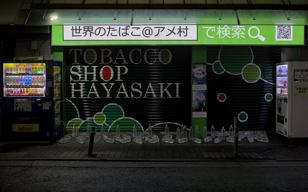 A vibrant flat lay of Shiseido and Kanebo makeup products, showcasing a variety of foundations, lips