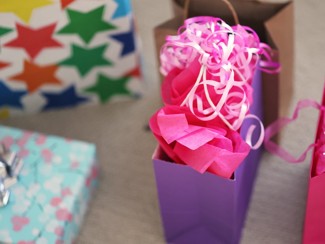 An image showing a beautifully wrapped gift using washi tape instead of traditional ribbon, highligh
