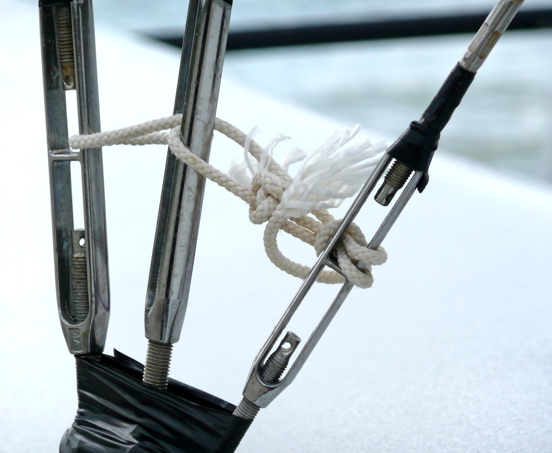 A close-up image of organized cables and chargers labeled with washi tape, depicting a tidy workspac