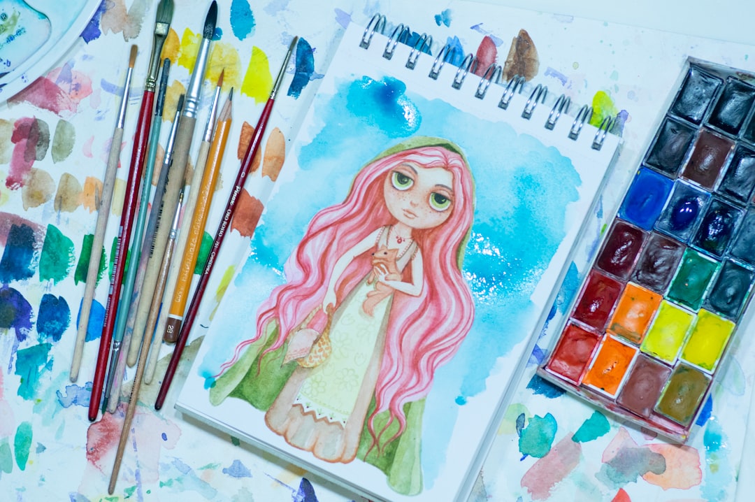 A visually striking image showing a colorful illustration created with Tombow brush pens, emphasizin