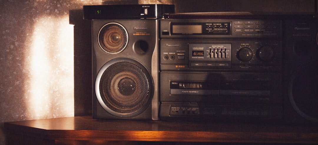 Image showcasing the Panasonic SC-HTB900 with its wireless subwoofer, set up in a stylish living roo