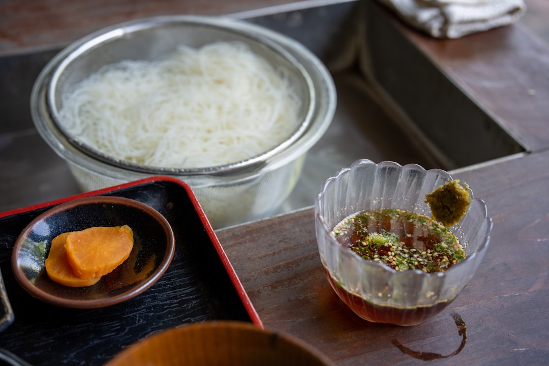 Step-by-step collage or single image showing the preparation of key bento ingredients: cooking rice