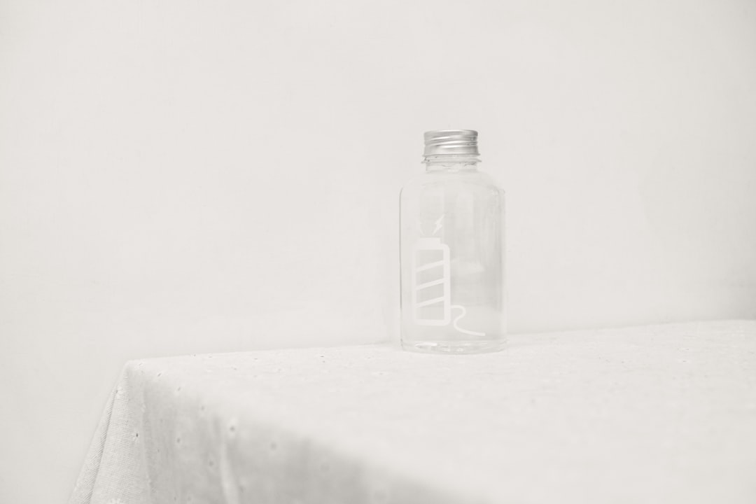 A high-quality hero image featuring the iconic SK-II Facial Treatment Essence bottle. The bottle sho