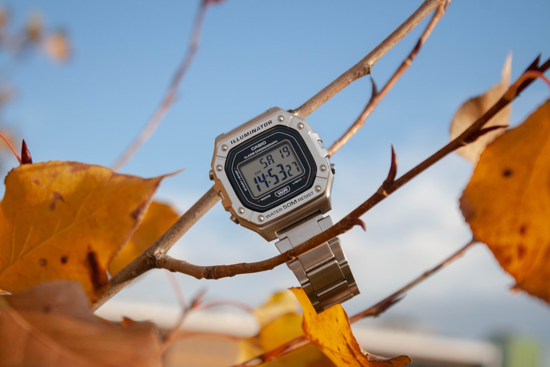 Action shot of an athlete or trail runner wearing the Casio G-Shock GBD-H1000 on a rugged trail, emp
