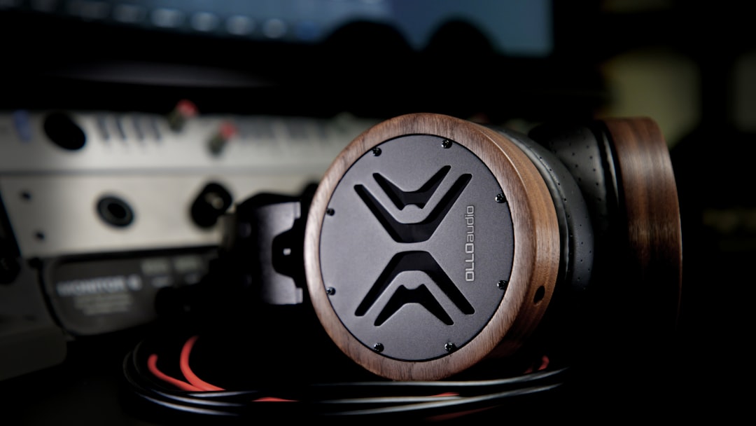 Close-up image of the Audio-Technica ATH-M50x headphones highlighting the ear cups, detachable cable