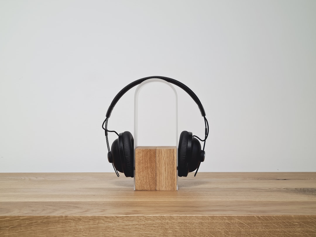 Artisanal close-up image of the Audio-Technica ATH-L5000 showcasing the natural wood ear cups and le