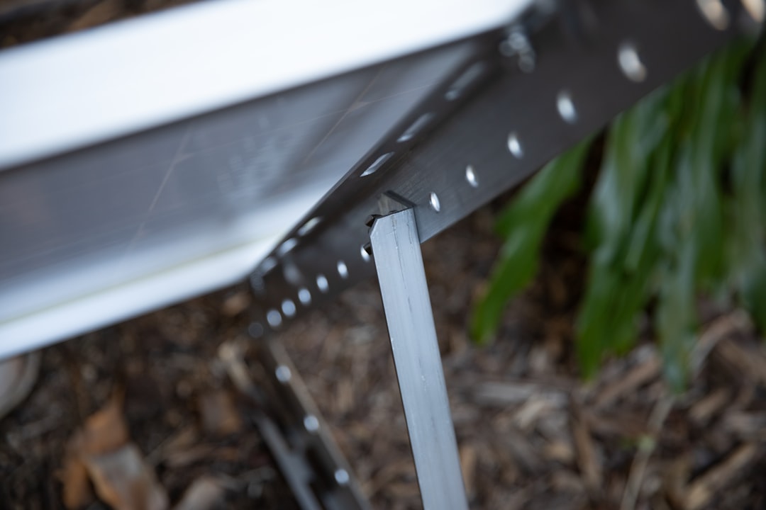 Close-up image of the Snow Peak Pack & Carry Table fully unfolded, showing the honeycomb aluminum to