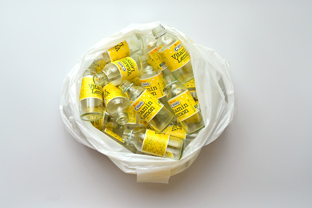 A lifestyle photo showing a compact Japanese skincare kit with travel-friendly bottles including Had