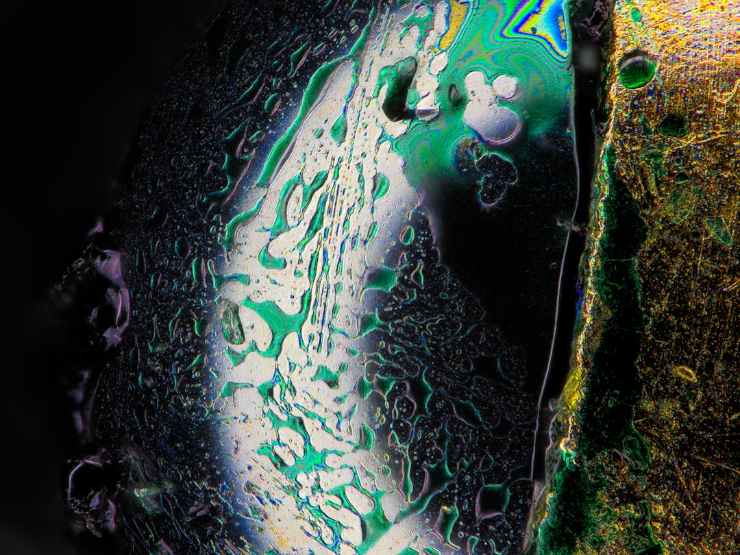 Close-up image of the Uni Mitsubishi Pencil Jetstream Prime ballpoint pen in use, showing the pen ti