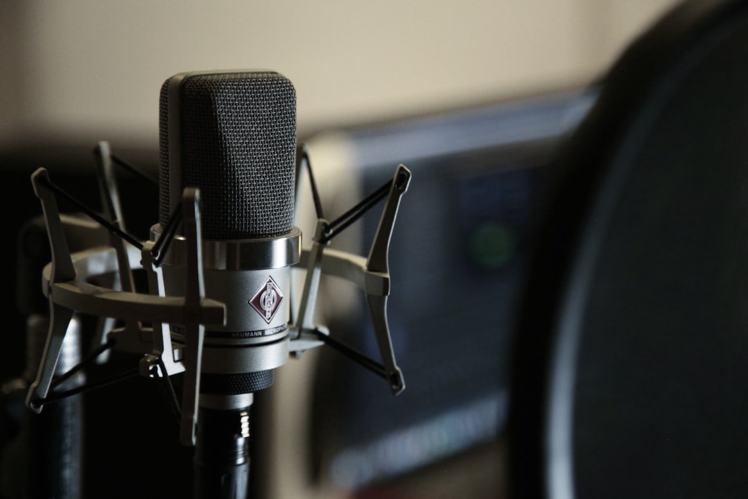 An image of the AT2020 condenser microphone on a home studio desk setup, highlighting its popularity