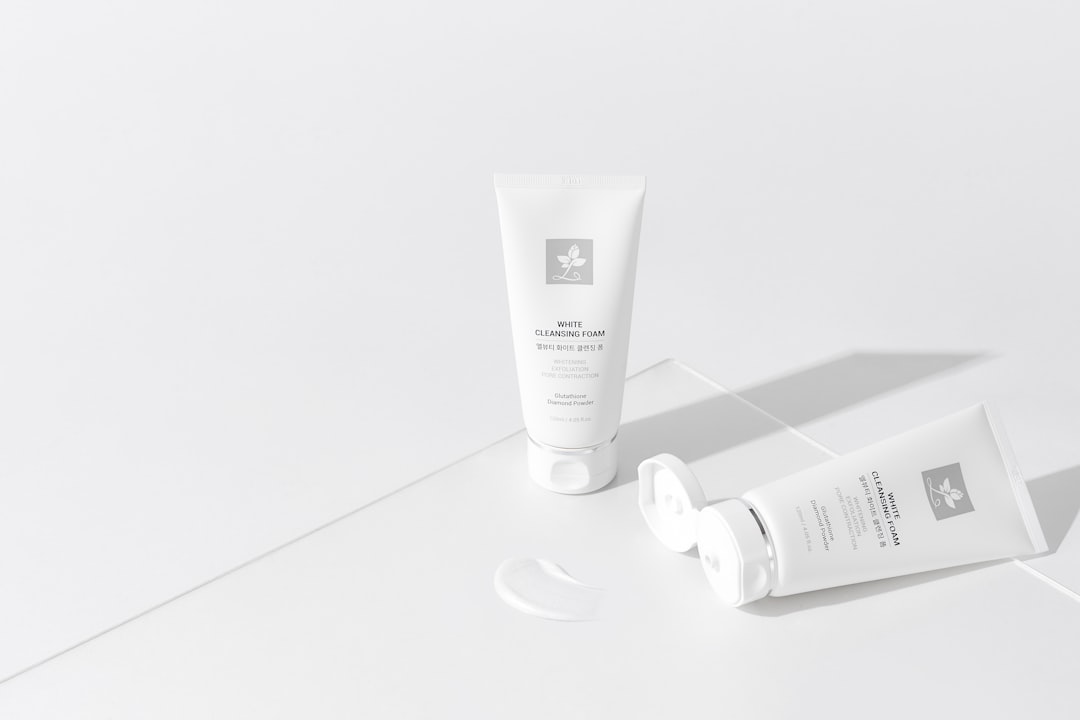 Close-up product shot of the three featured Japanese sunscreens (DHC Suncut Q10 Perfect Gel, Hada La