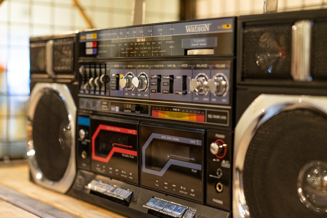 Infographic-style image illustrating key features to consider when buying a turntable: drive types (