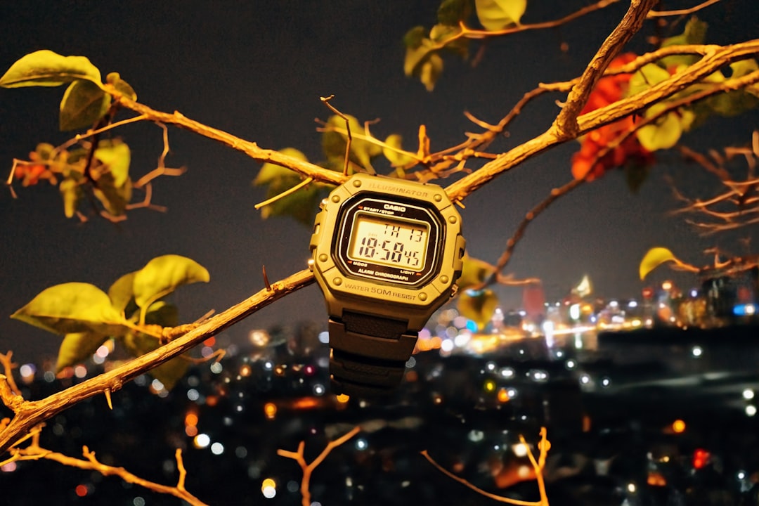 A dynamic hero image showing two smartwatches side-by-side: a sleek Sony smartwatch on a person's wr