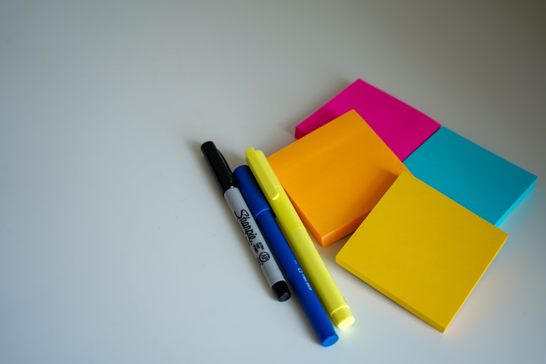 A vibrant, well-lit flat lay photo featuring a selection of Zebra Mildliners and Pentel highlighters