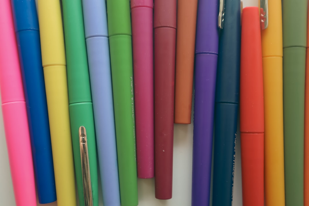 Close-up image of the Hightide Roll Pen Case unrolled, showing elastic loops holding pens and brushe