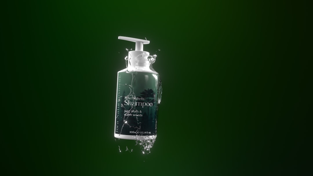 Image of Shiseido Ultimune Power Infusing Concentrate bottle with gel-serum texture visible on a fin