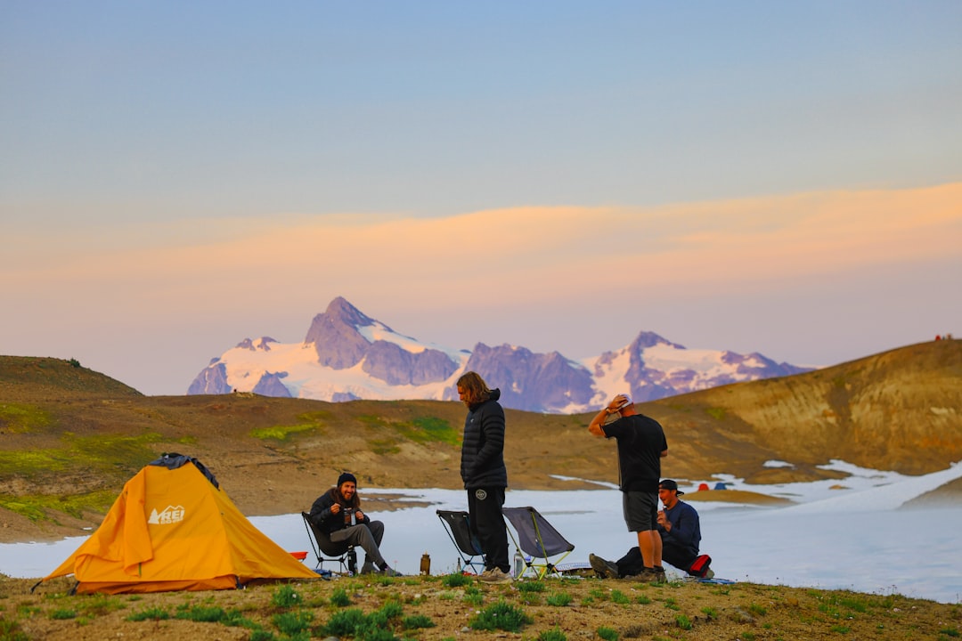 A striking hero image showing a Snow Peak tent (preferably the Land Lock Tent or Land Cruiser Tent)