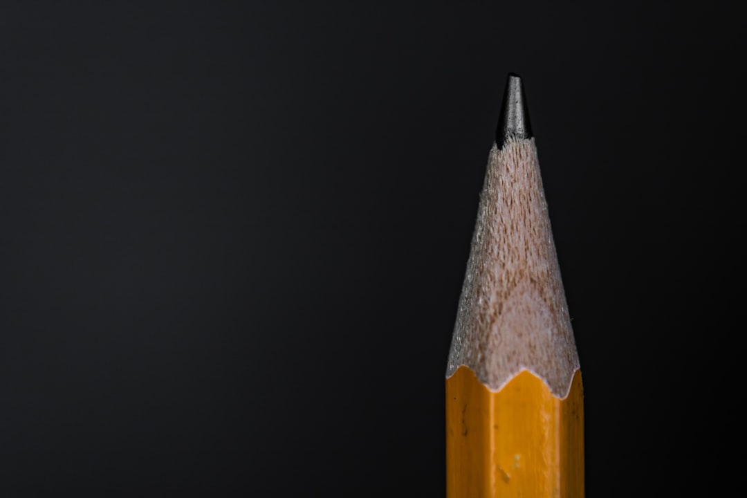 Close-up image of the Uni Mitsubishi Hi-Polymer eraser with visible texture and slight graphite resi