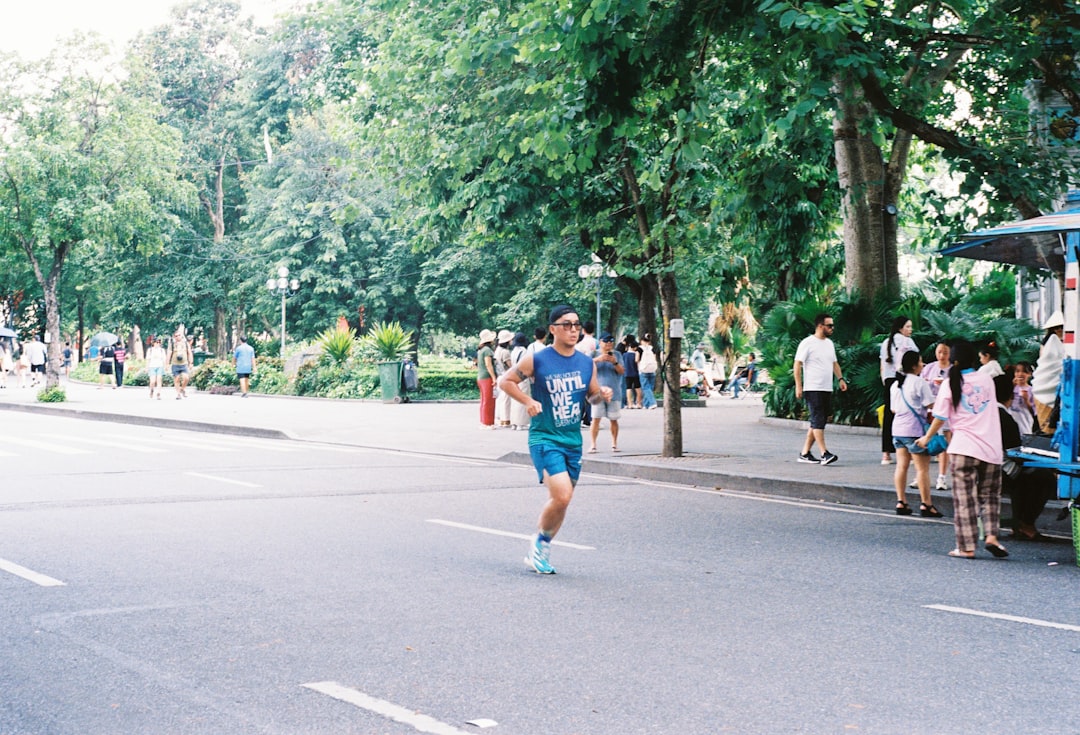 Lifestyle image of an active runner wearing the Panasonic RP-HGS10 clip-on MP3 player clipped to the
