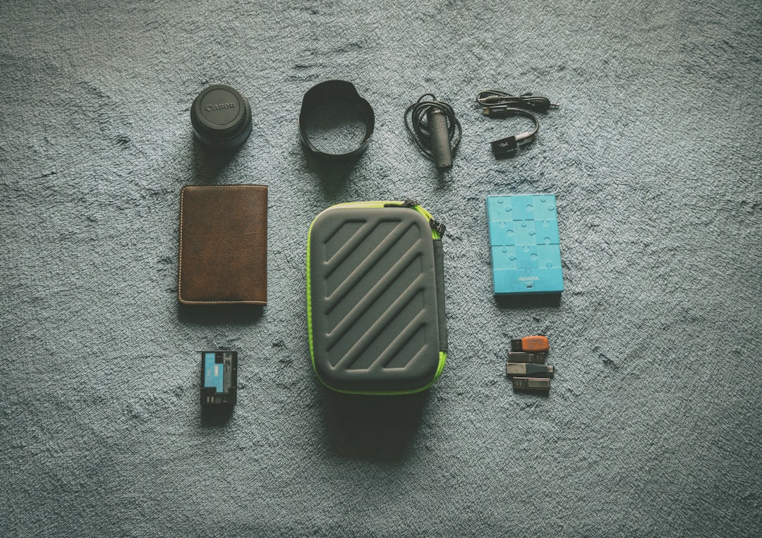Photo of Snow Peak titanium cookware set nested together on a backpacking mat with a scenic mountain