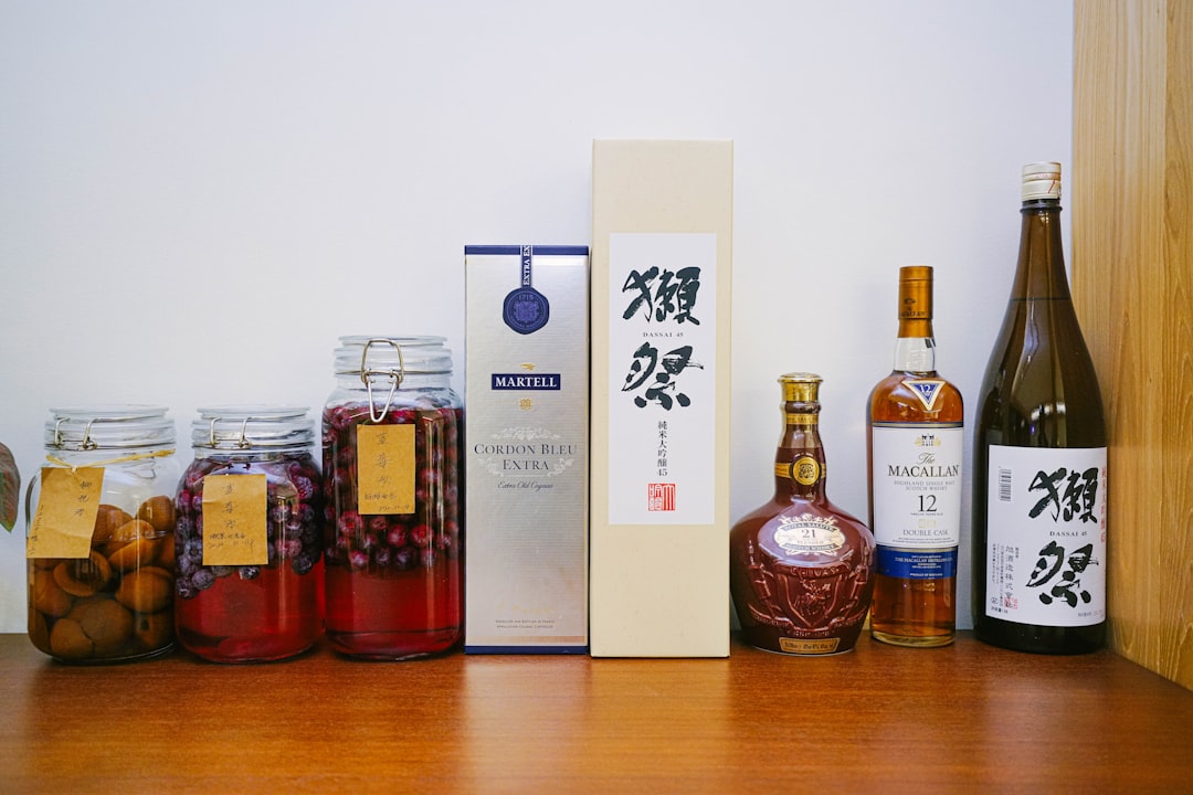 A sleek, high-quality hero image of the SK-II Facial Treatment Essence bottle prominently displayed