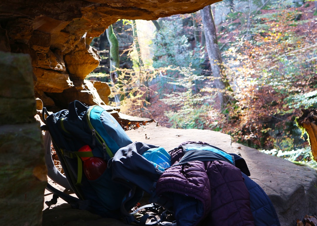 Product lineup photo showing the three main Nanga products discussed: Down Hugger 800 STD sleeping b