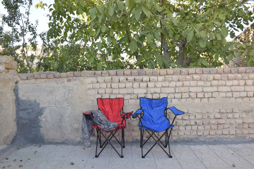 Close-up product shot of the Snow Peak Low Chair highlighting its sturdy aluminum frame and durable 