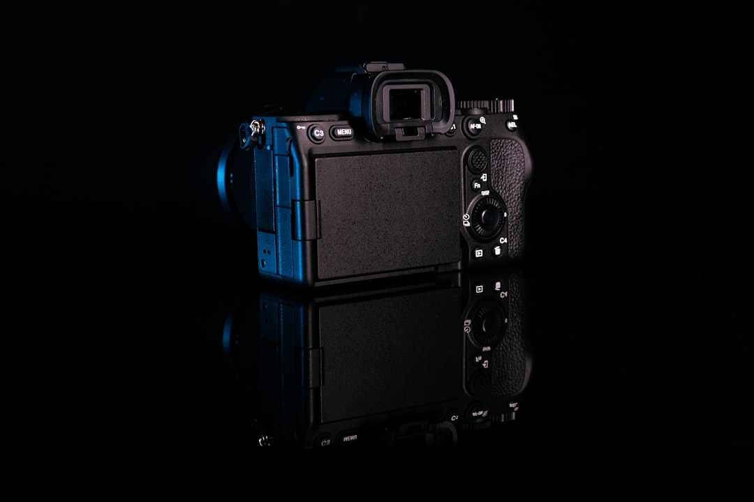 Detailed product image of the Sony Alpha a7 IV showcasing the full-frame sensor badge, E-mount lens,